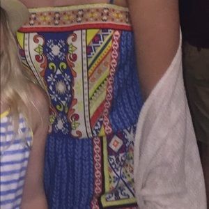 Fun blue red and yellow patterned romper size small